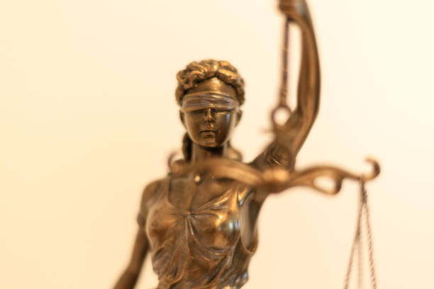 istock Close-up of a justice figure shines from sunlight 1289948016