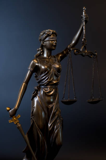 istock Close-up of a justice figure shines from sunlight 1289948219