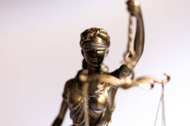 istock Close-up of a justice figure shines from sunlight 1289948221