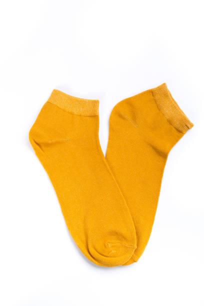 istock Pair of cute short socks on white background, top view 1289948738