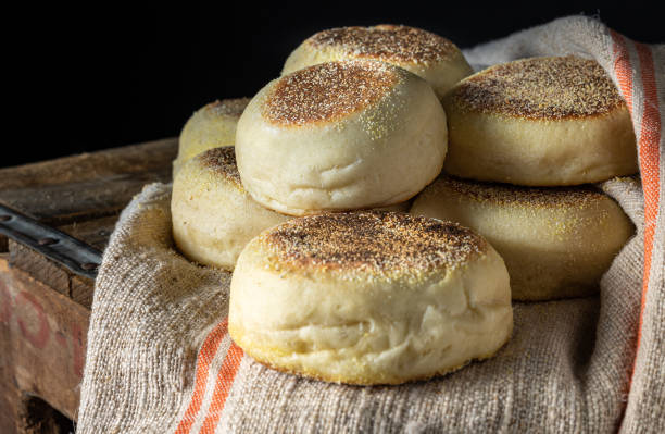 Homemade sourdough English muffins. Close up, studio shot. english muffin stock pictures, royalty-free photos & images