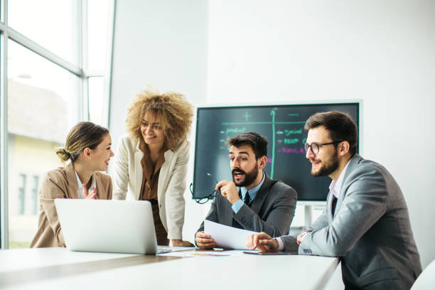 istock Group of business people working inside modern office 1289955263