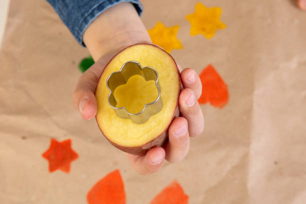 istock Print Potato Stamps. handmade gift wrapping with an exclusive print pattern. 1289958002