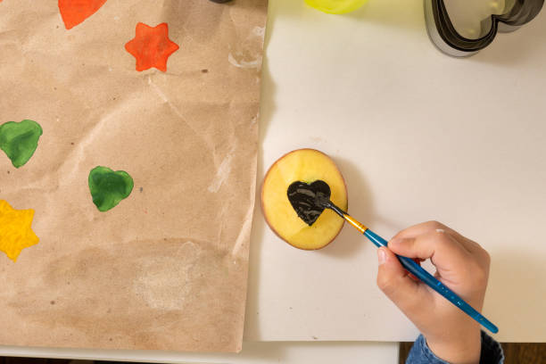 istock Print Potato Stamps. handmade gift wrapping with an exclusive print pattern. 1289958549