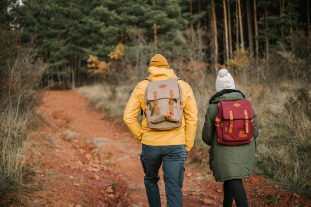 istock Couple is talking a walk, and enjoying in the nature. 1289958554