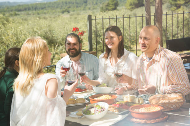 istock Friends having lunch on the open-air terrace 1289959765