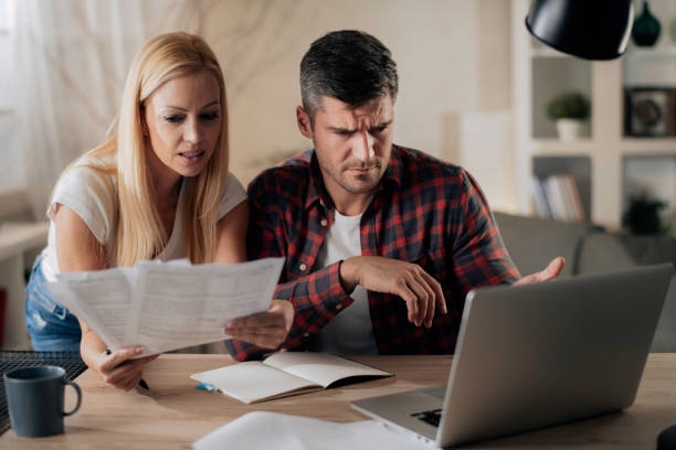 istock Young couple having financial problems. stock photo 1289961100