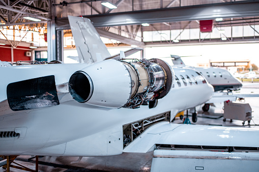 The private airplanes seen in the hangar during the maintenance and checks before the flights.