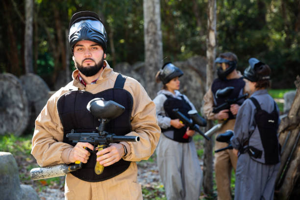 istock Male paintball player ready for game 1289962639