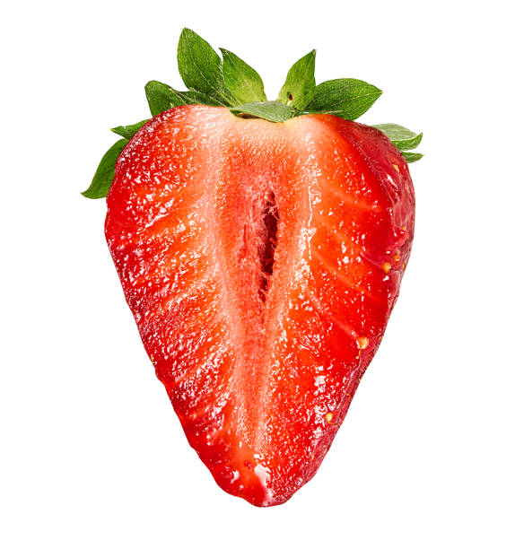 Halved strawberry isolated on white background