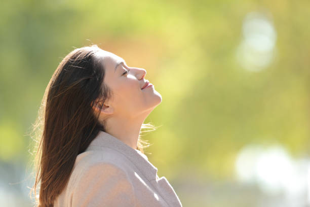istock Relaxed entrepreneur breathing fresh air in a park 1289964628