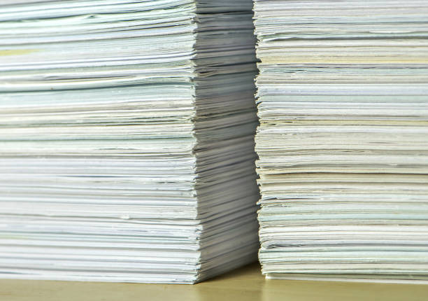 istock pile of paper documents in the office 1289966330