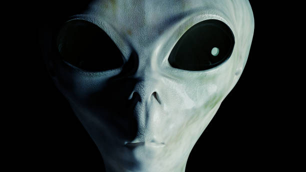 istock Spooky alien's face on black background. 3D rendered illustration. 1289974007