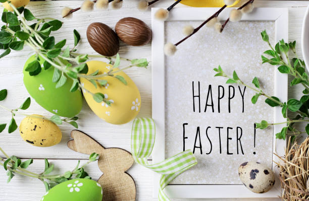 istock greeting card with colorful easter eggs and spring flowers. mock up frame with copy space 1289975201
