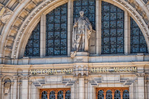 Victoria and Albert art museum building entrance sign on historic architecture in Chelsea and Kensington London, UK - June 22, 2018: Victoria and Albert art museum building entrance sign on historic architecture in Chelsea and Kensington borough royal albert hall stock pictures, royalty-free photos & images
