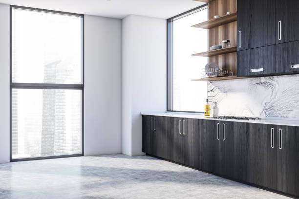 istock White and black kitchen corner with cabinets and window 1289979165