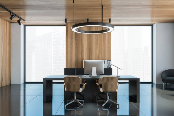 istock Modern gray and wooden CEO office 1289980246