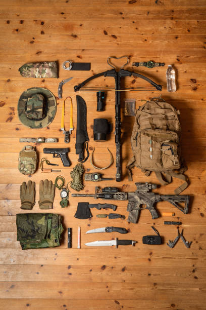 survival gear flat lay - water bottle survival military bottle imagens e fotografias de stock