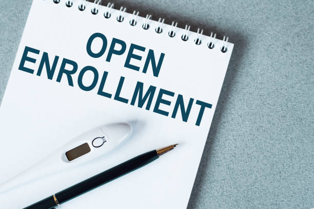 istock Open Enrollment blank list, health concept background 1289983909