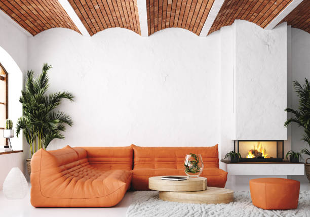 オレンジ色の革張りのソファとレンガの天井が付いたモダンなリビングルームのロフト - loft apartment living room contemporary house ストックフォトと画像