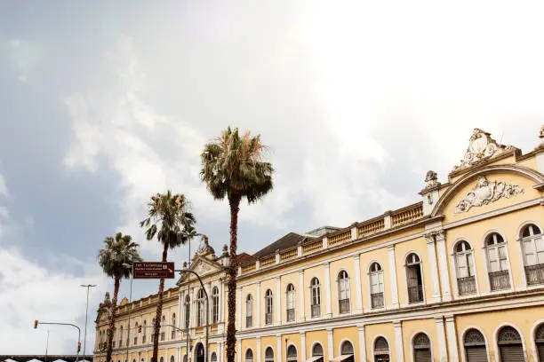 The Porto Alegre Central Public Market is a historic building in the city of Porto Alegre. In the picture one of the fronts of the buildings is visible from a point of view that allows a big portion of the sky to be seen.