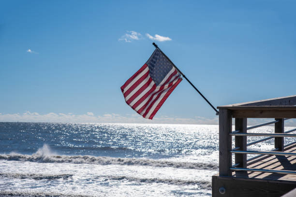 istock American Flag on the Oak Island Pier 1289988438