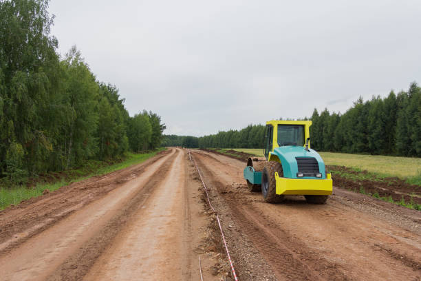 istock Special road vehicles. Compactor At Road Compaction Works 1289990349
