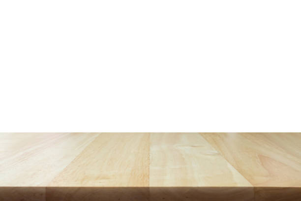 istock Empty wooden table top isolated on white background for product display montage 1289990495