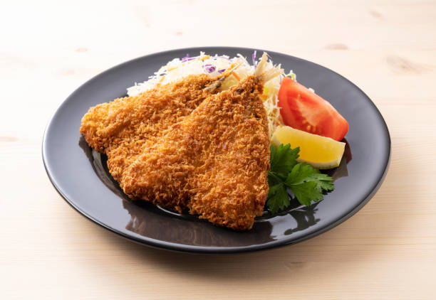 istock Fried horse mackerel served on a plate placed on a wooden table 1289991628