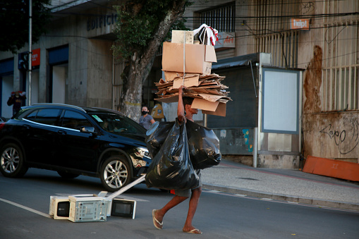 salvador, bahia, brazil - december 2, 2020: home carries material for recycling collected on the street in the city of Salvador.