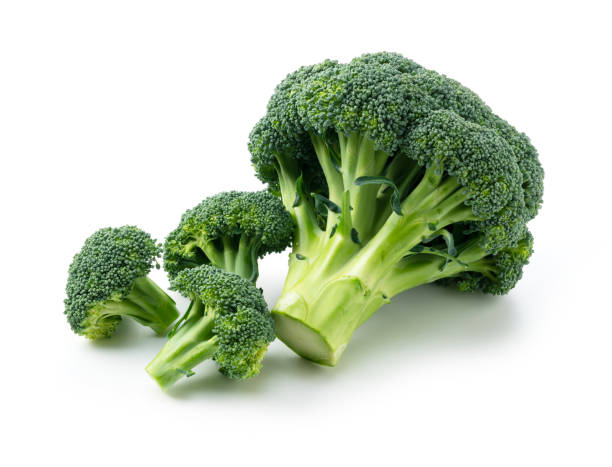 istock Close-up of cut broccoli placed on a white background 1289991869