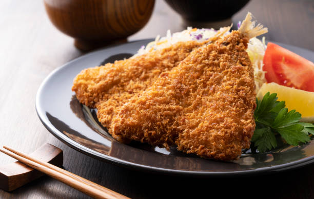 istock Fried horse mackerel served on a plate placed on a wooden table 1289992607