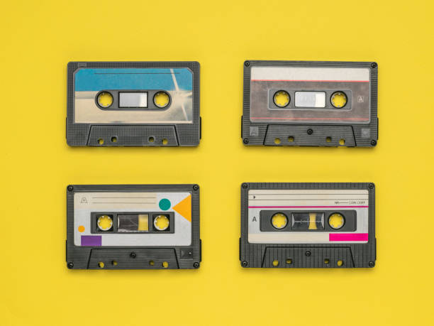 istock Four tape recorders on a yellow background. 1289998777