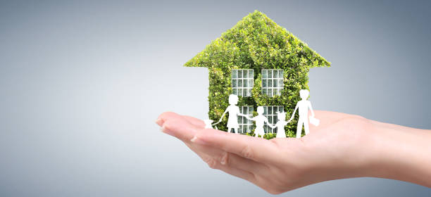 istock House Residential Structure in  hand ,business home idea 1290003724