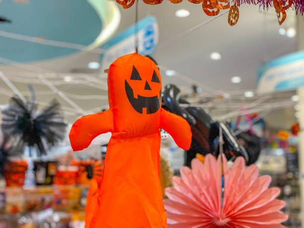 istock Jack o pumpkin hanging on ceiling for halloween holiday decoration 1290005685