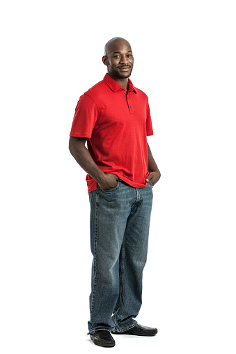 Full length portrait of a handsome black man isolated on a white background