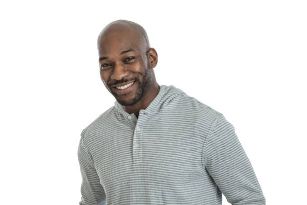 Handsome Black Man Portrait Portrait of a handsome late 20s black man isolated on white background bald guys with beards stock pictures, royalty-free photos & images