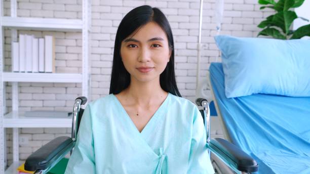 istock Happy patient getting well improvement at hospital 1290011097