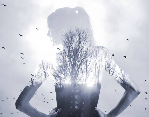 istock Multiple exposure of woman, forest and birds 1290011416
