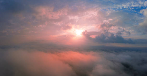 istock Dawn sky, sunbeams and dreams, morning panorama. 1290013057