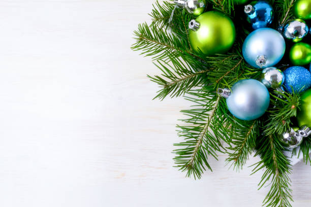 istock Christmas decorations fir branches, blue and green ornaments 1290018211