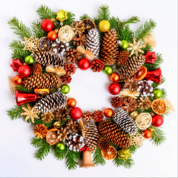 istock Christmas wreath with fir branches, cones and ornaments 1290018230