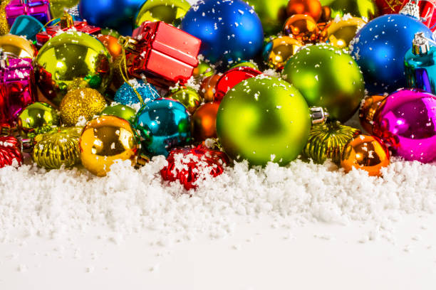 Christmas multicolored toys, snow, background