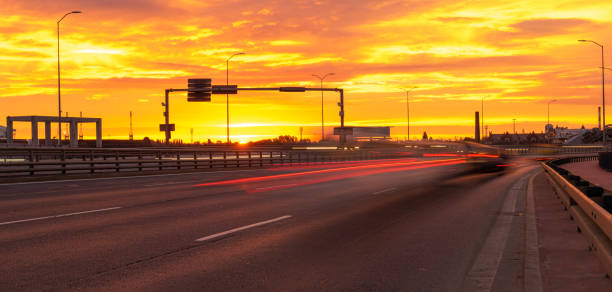 istock highway that runs through the city during a spectacular sunrise 1290018249