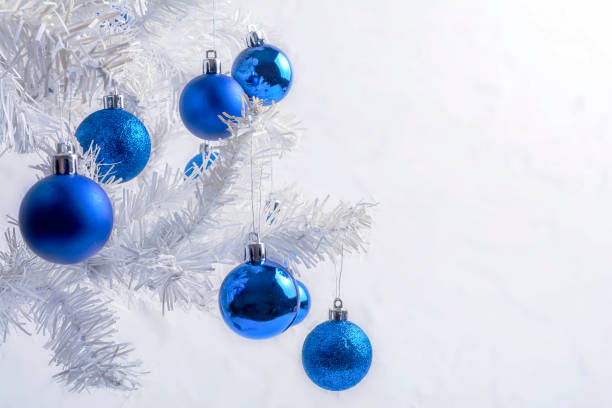 istock White Christmas tree with blue balls copy space 1290018315