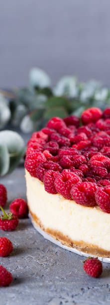 istock Delicious cheesecake  with raspberries 1290019651