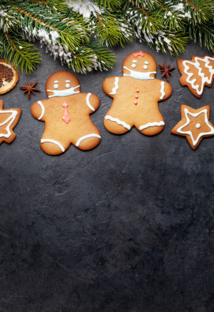 istock Greeting card with gingerbread cookies in face mask 1290021539
