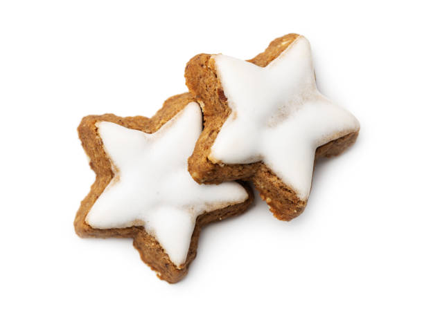 istock Icing gingerbread stars. Traditional Christmas cookies. 1290025579