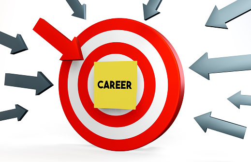Career note paper on the Target Board and arrows pointing to it. The concept of achieving the goal.