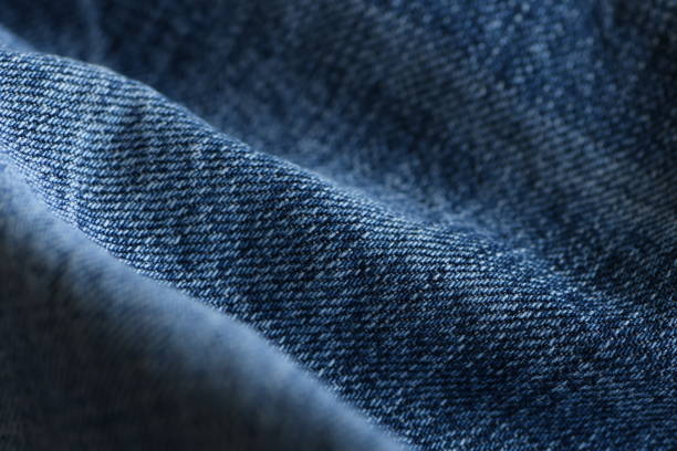 istock Part of denim jeans texture, close up. 1290029064